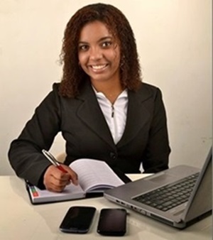 Female administrator sitting in office.