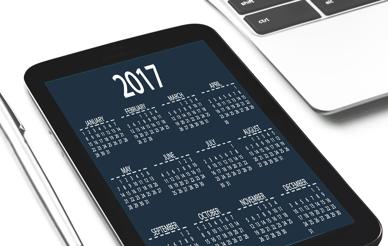 digital schedular on ipad placed on top of a desk